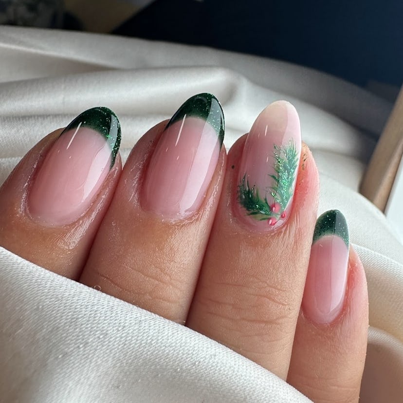 Try sparkling emerald French tips with mistletoe nail art.