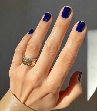 Navy and gold Christmas French tips