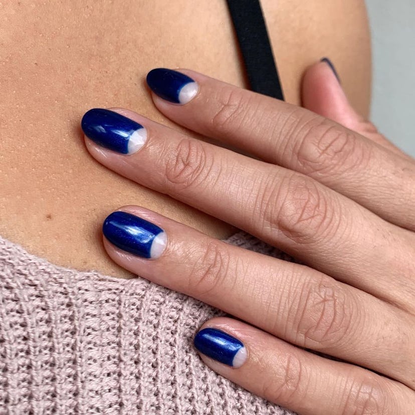 Try sapphire blue nails with half moon cut-outs.