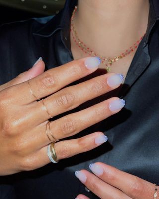 Blue glitter french tip nails