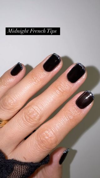 black and glitter french tip nails