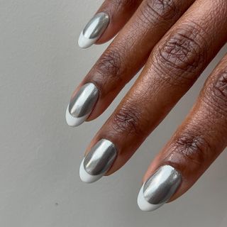 @paragonnails silver reverse French tip nails