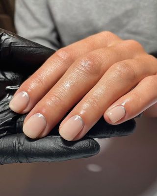 Reverse silver French tips nails