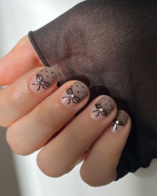 @pink_oblivion bow nail design