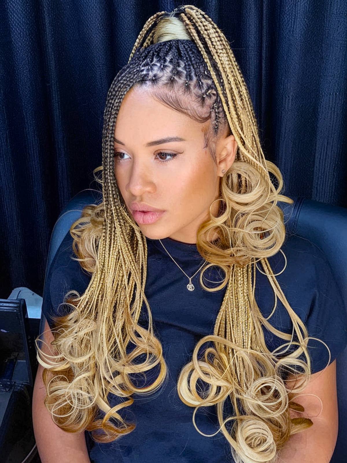 High ponytail with blonde French curls and tight box braids