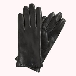 Flat lay image of black leather gloves