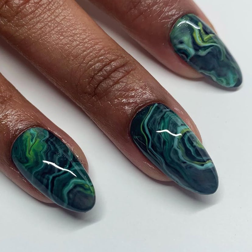 Try nails with gemstone-inspired details for Capricorn season 2025.