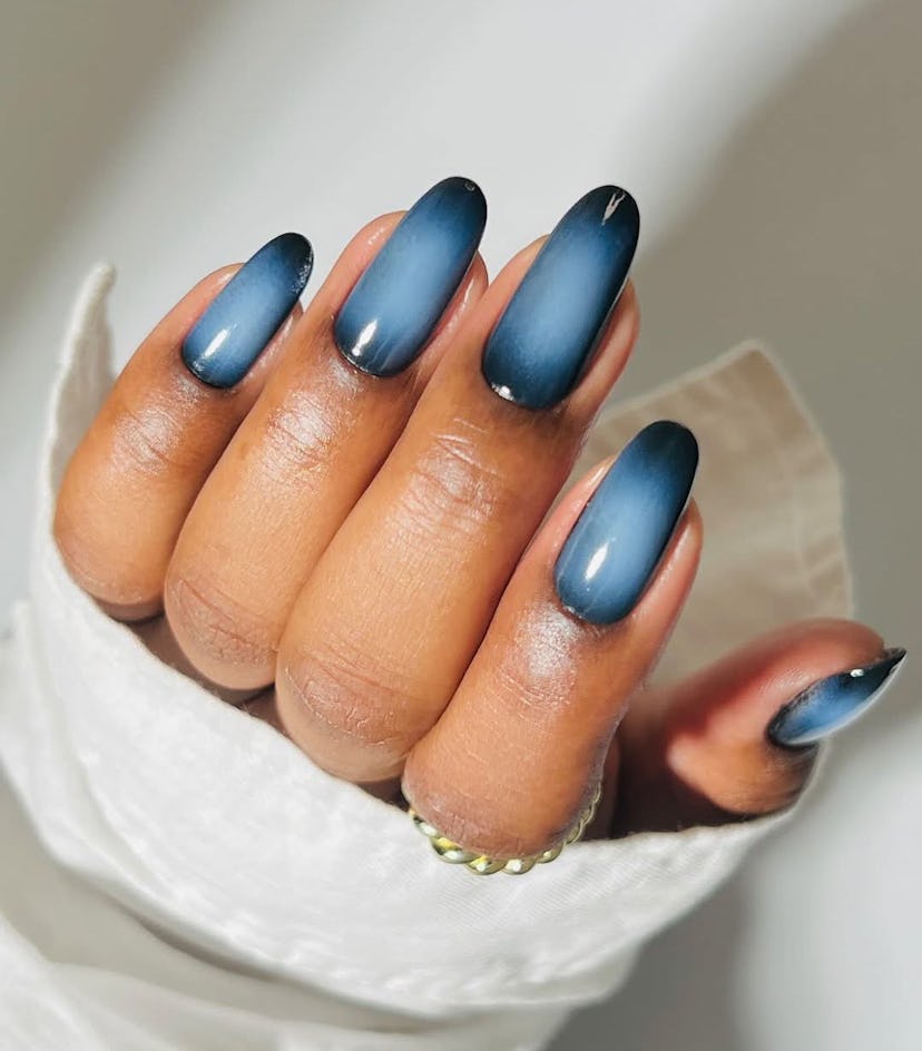 Try navy blue aura nails for Capricorn season 2025.