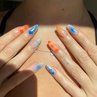 Mismatched manicure for Madelyn Cline by Zola Ganzorigt.