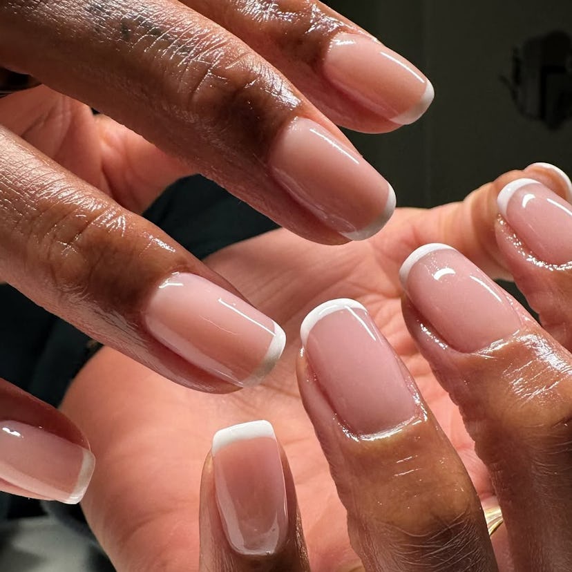 Try classic micro French tip nails for Capricorn season 2025.