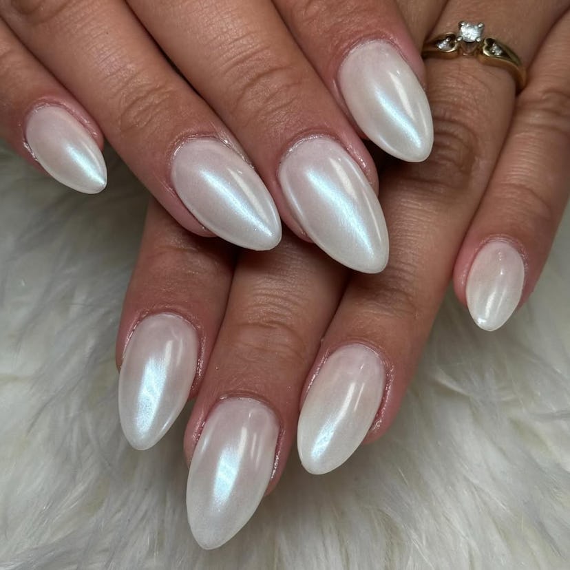 Try white chrome nails for New Year's Eve 2024.