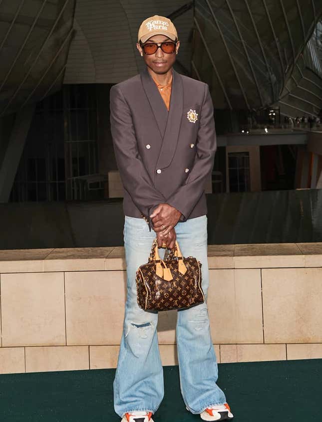 Image for article titled Travis Scott, A$AP Rocky and Other Male Rappers Who Rock Designer Purses