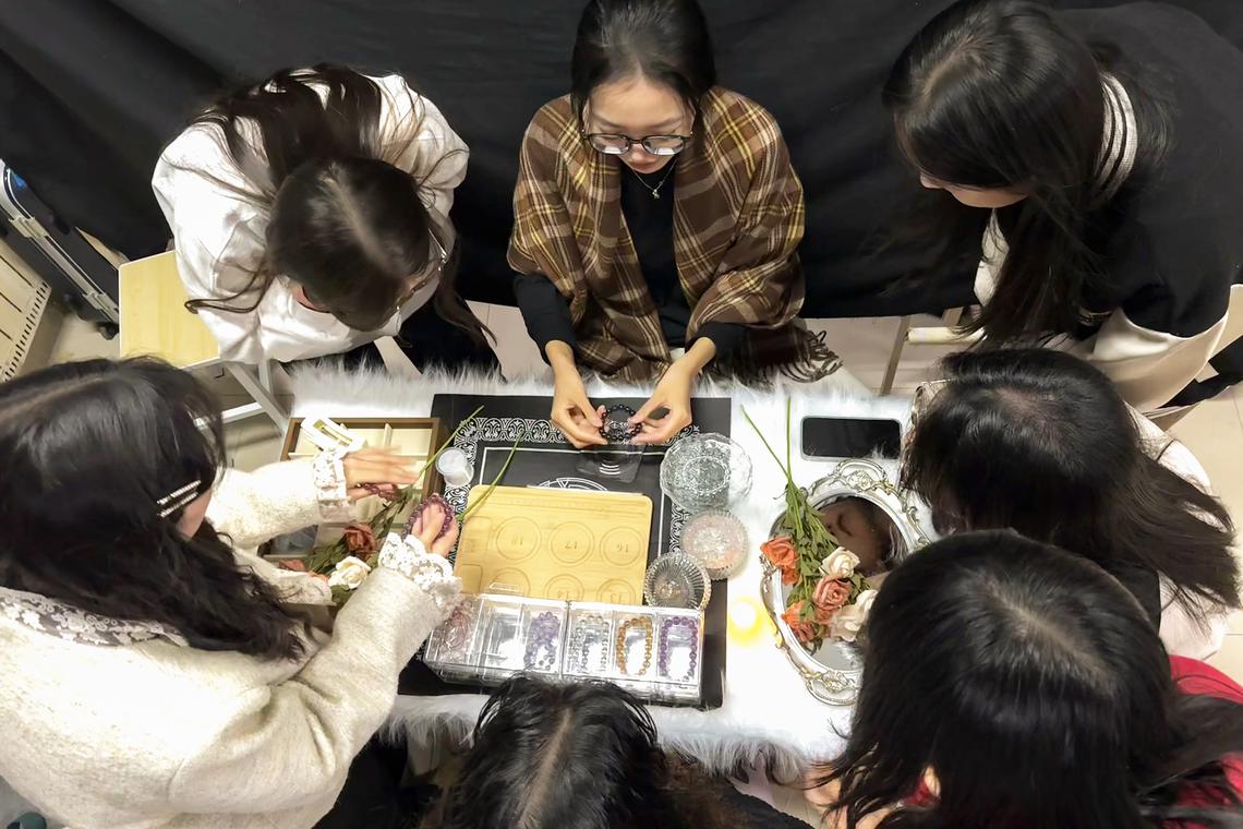 mndorm - First-year master’s student Wang Rui, 22, and her five roommates, pooled around 3,000 yuan (S$558) in capital to get their dorm-based crystal shop rolling. Credit: Wang Rui