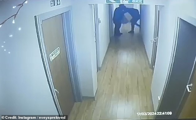 One of the thieves then turned around and attempted to use his body weight to kick open the door