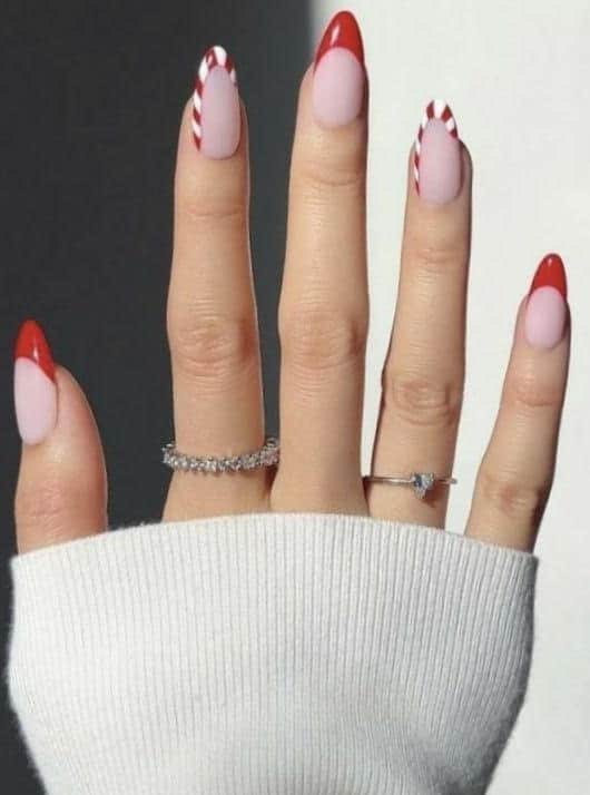 Candy Cane Stripes, one of the top festive nail trends by Mylee manicurist Tinu Bello. Photo by Sparkle PR.