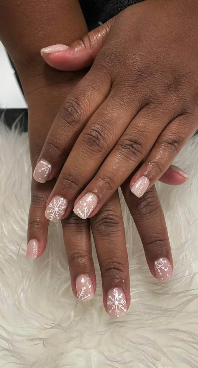 Icy Snowflakes on Clear Polish, one of the top festive nail trends by Mylee manicurist Tinu Bello. Photo by Sparkle PR.