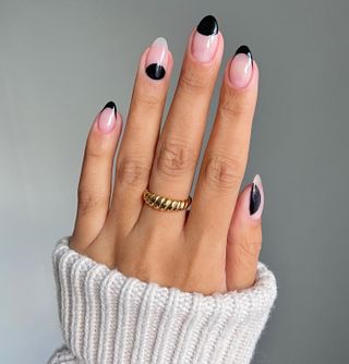 Black mod manicure by Iram Shelton.