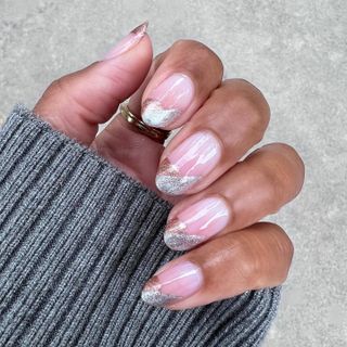 @themaniclub gold and silver French tip nails