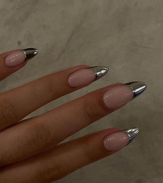 Metallic French Tips, one of the top festive nail trends by Mylee manicurist Tinu Bello. Photo by Sparkle PR.