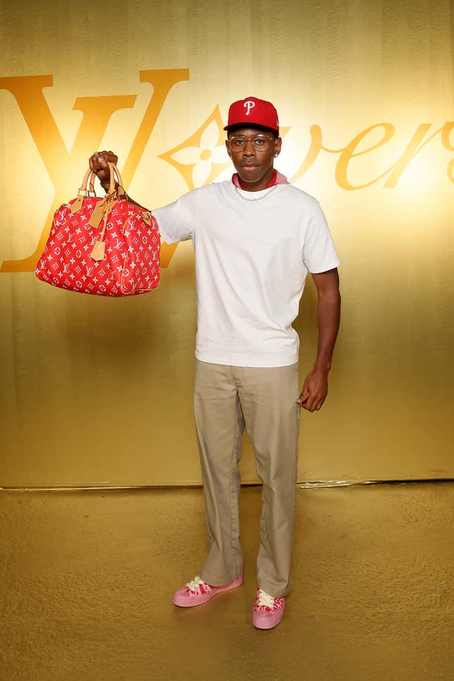 Image for article titled Travis Scott, A$AP Rocky and Other Male Rappers Who Rock Designer Purses