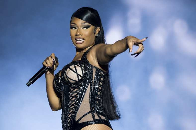 FILE – Megan Thee Stallion performs at the Reading Music Festival, England, Aug. 26 2022. Stallion along with Red Hot Chili Peppers and Ms. Lauryn Hill will headline this year’s Global Citizen Festival, as the anti-poverty nonprofit looks to focus attention on increasing inequality for girls and young women around the world. (AP Photo/Scott Garfitt, File)