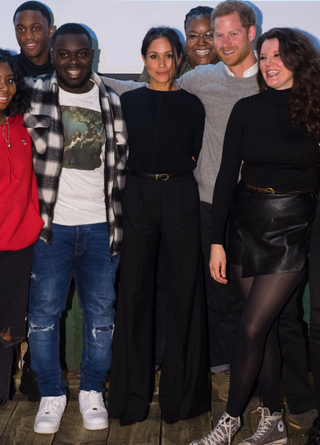 Prince Harry and Meghan Markle pose during a visit to Reprezent 107.3FM in Pop Brixton on January 9, 2018 in London, England