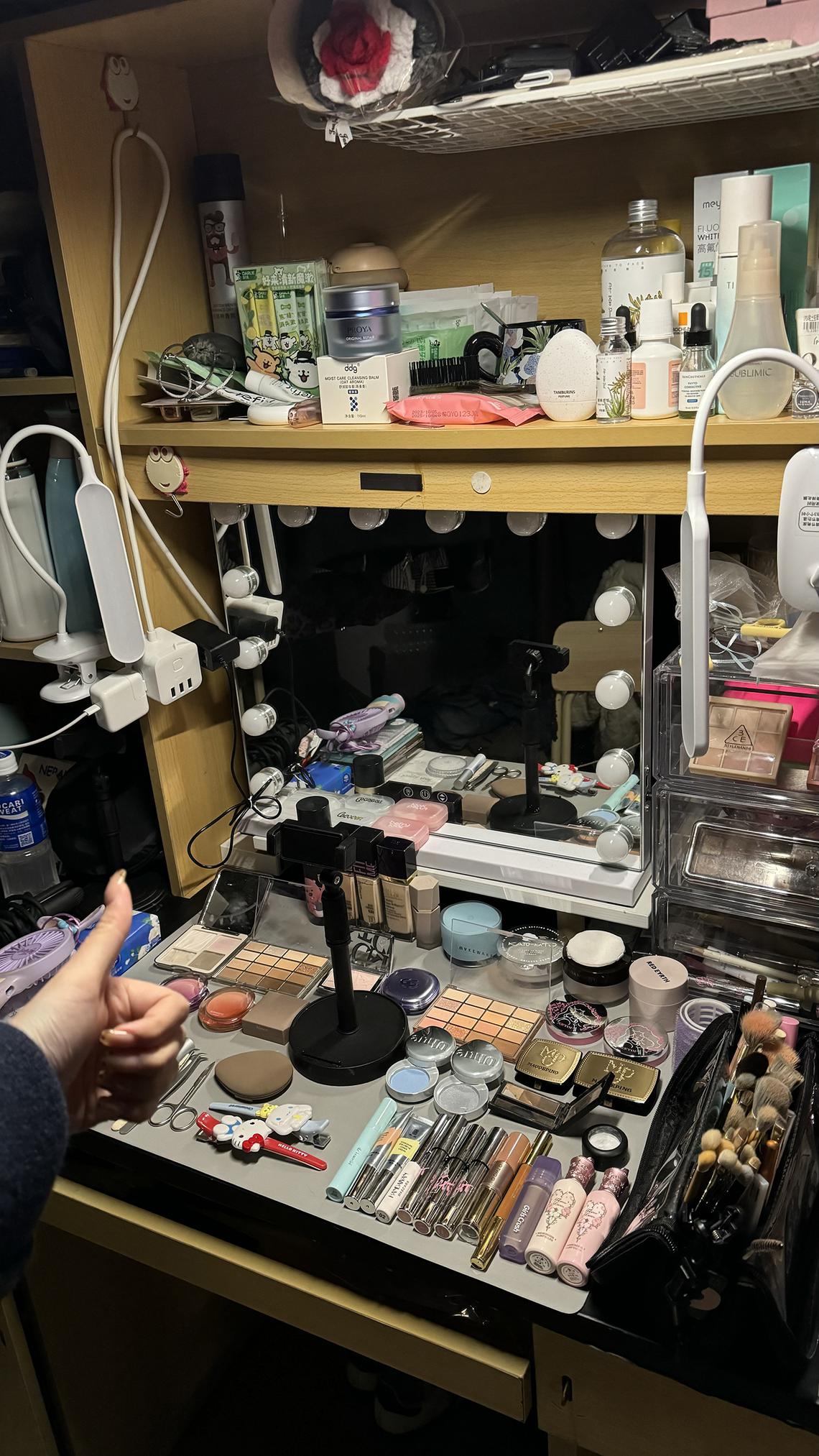 mndorm - Second-year vocational college student Zhang Ziye, 19, started offering makeup services in her dorm room a year ago, charging 30 to 50 yuan per person. Credit: Zhang Ziye