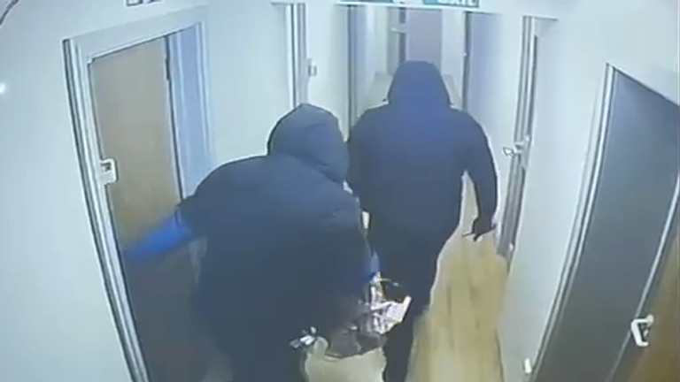 The burglars entering the premises