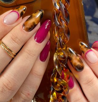 tortoise shell and wine red manicure