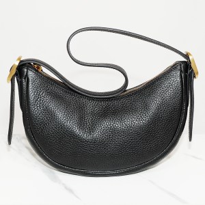 WWD Shop editors test Quince black shoulder bag 