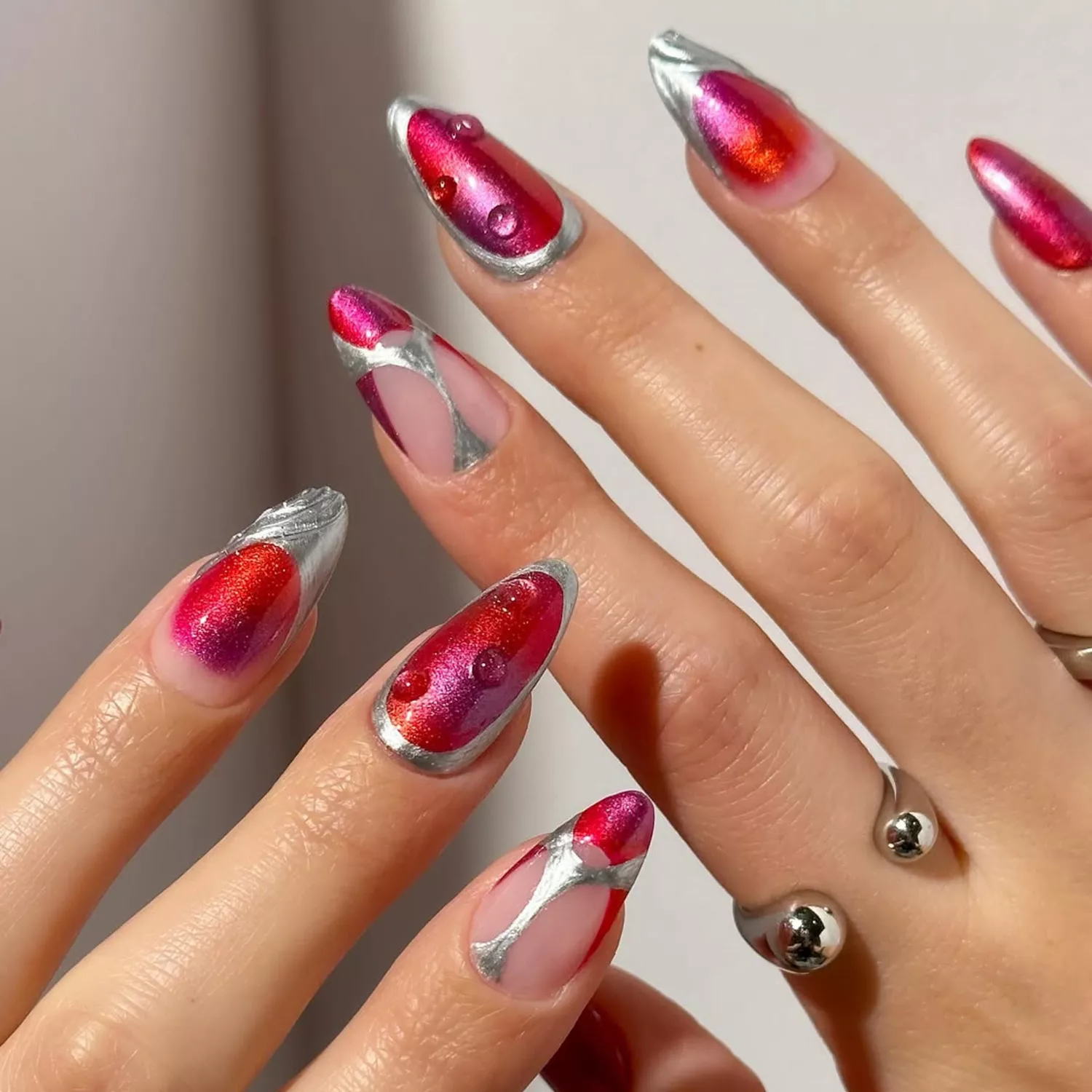 silver, red, and purple chrome french manicure