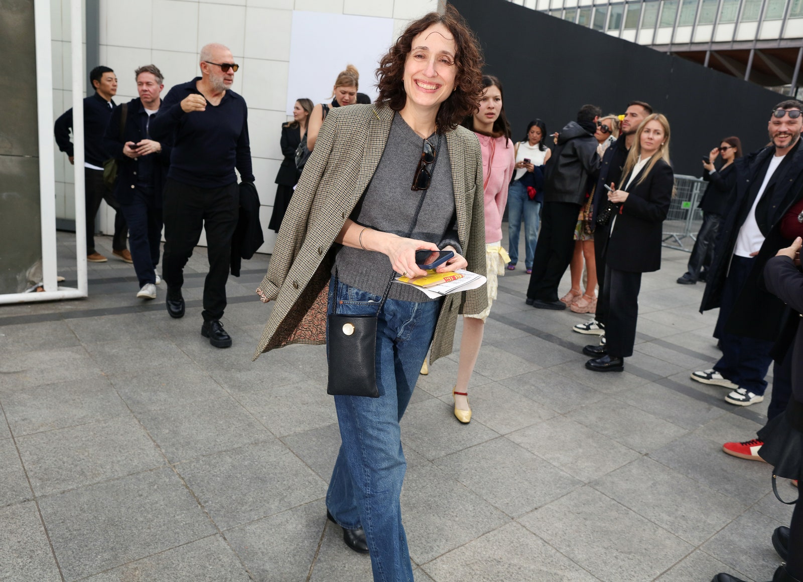 Image may contain Boris Akunin Liam Hemsworth Yoshinobu Miyake Clothing Pants Accessories Bag Handbag and Footwear