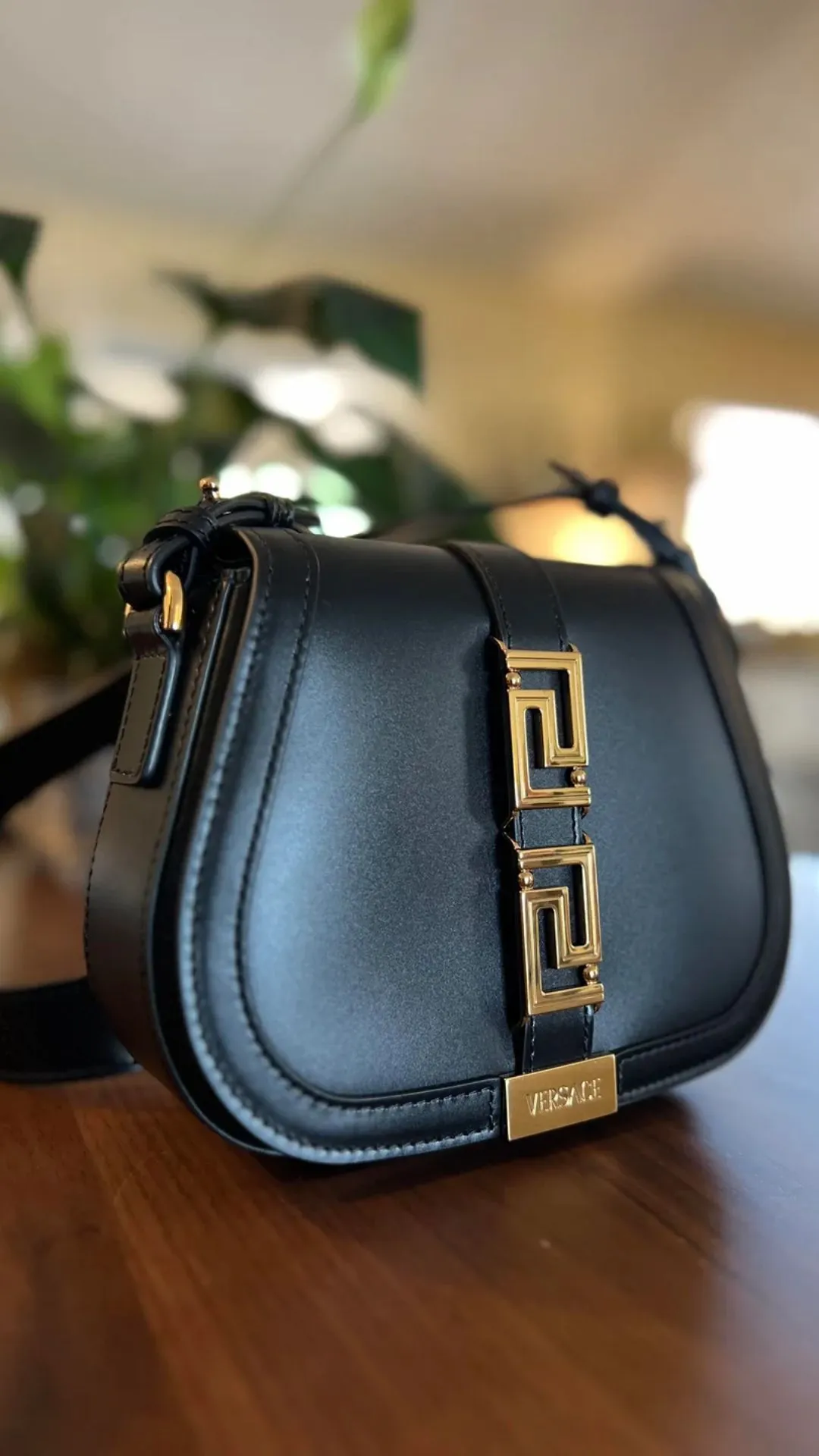 Versace Greca Goddess Bag has the iconic Greca motif in hardware or stitching with a sleek, architectural design perfect for parties and events.