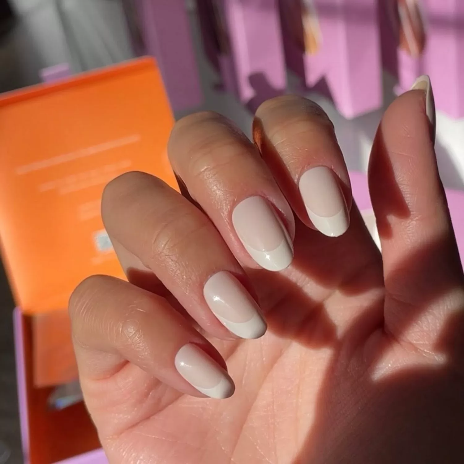 Manicure with beige base and creamy French tips