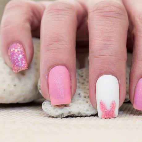 easter bunny nail art design with a oink glitter bunny on an accent nail