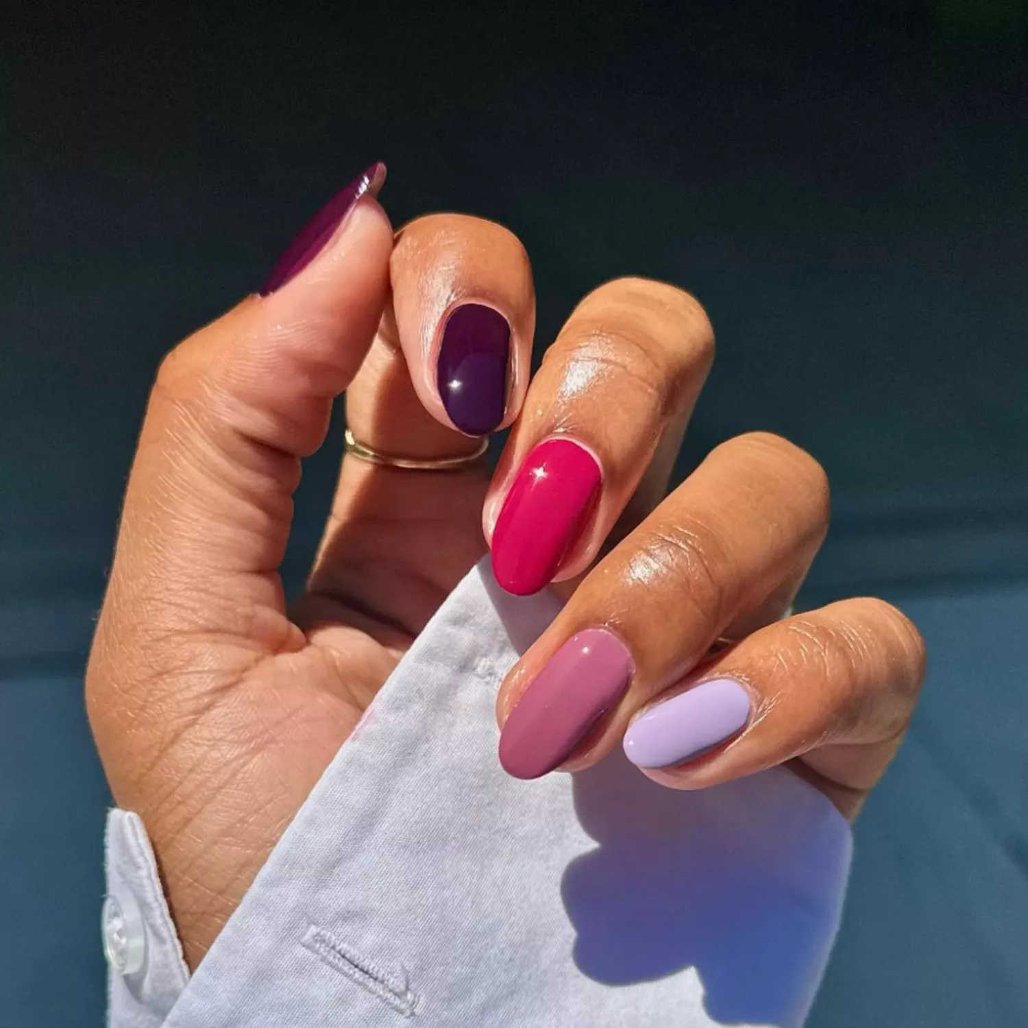 Berry-colored gradient manicure.